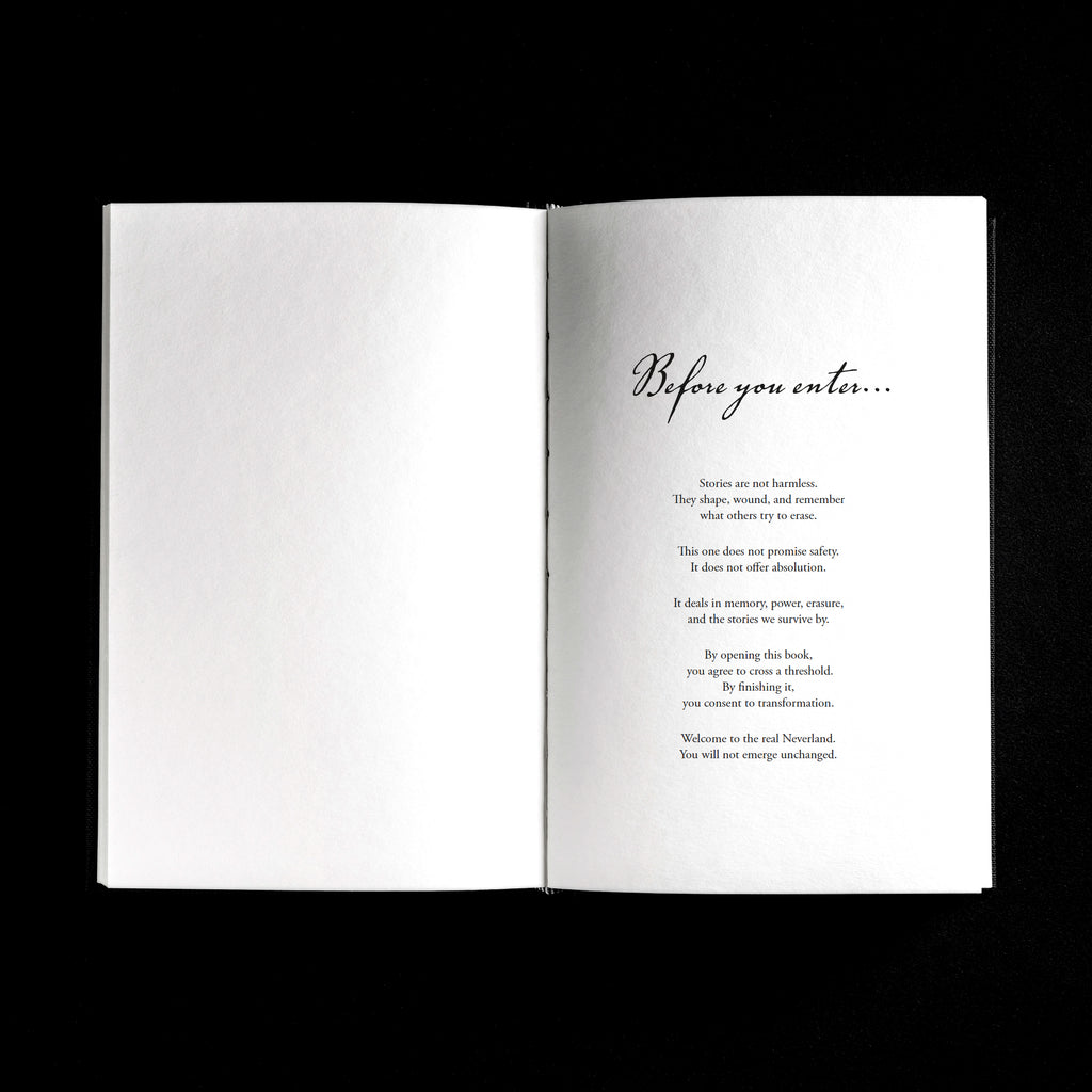 An open book laid flat against a solid black background, showing a white interior spread with the heading 'Before you enter.'